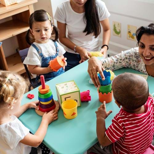 Early years education, small children with toys